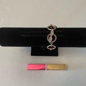 Victoria’s Secret Gold bracelet w/ Angel Wing detail & a dual scented rollerball